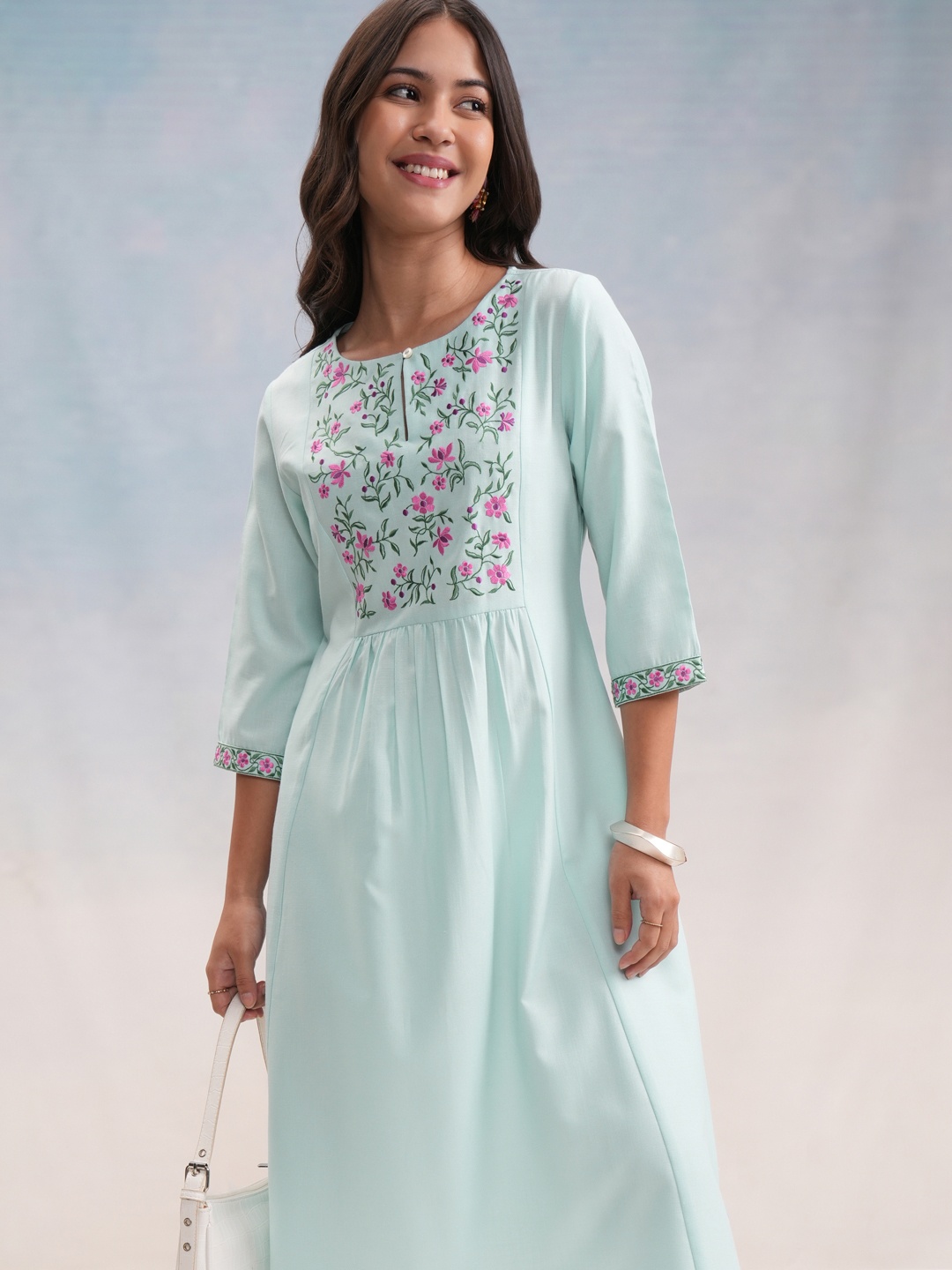 

Vishudh Blue Floral Embroidered Keyhole Neck A-Line Straight Kurta