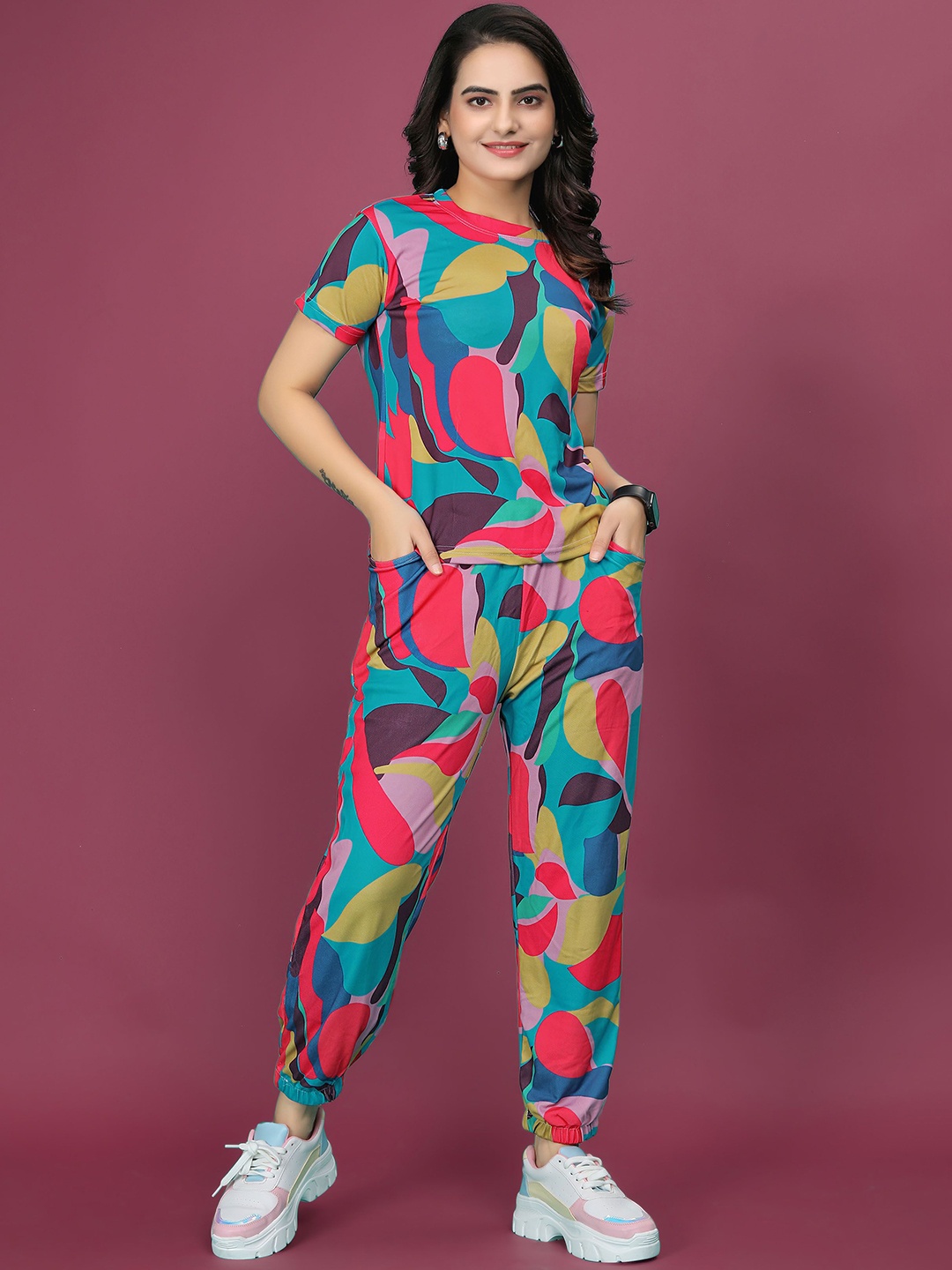 

SAKARMAA Women Abstract Printed T-Shirt With Joggers Co-Ords, Pink