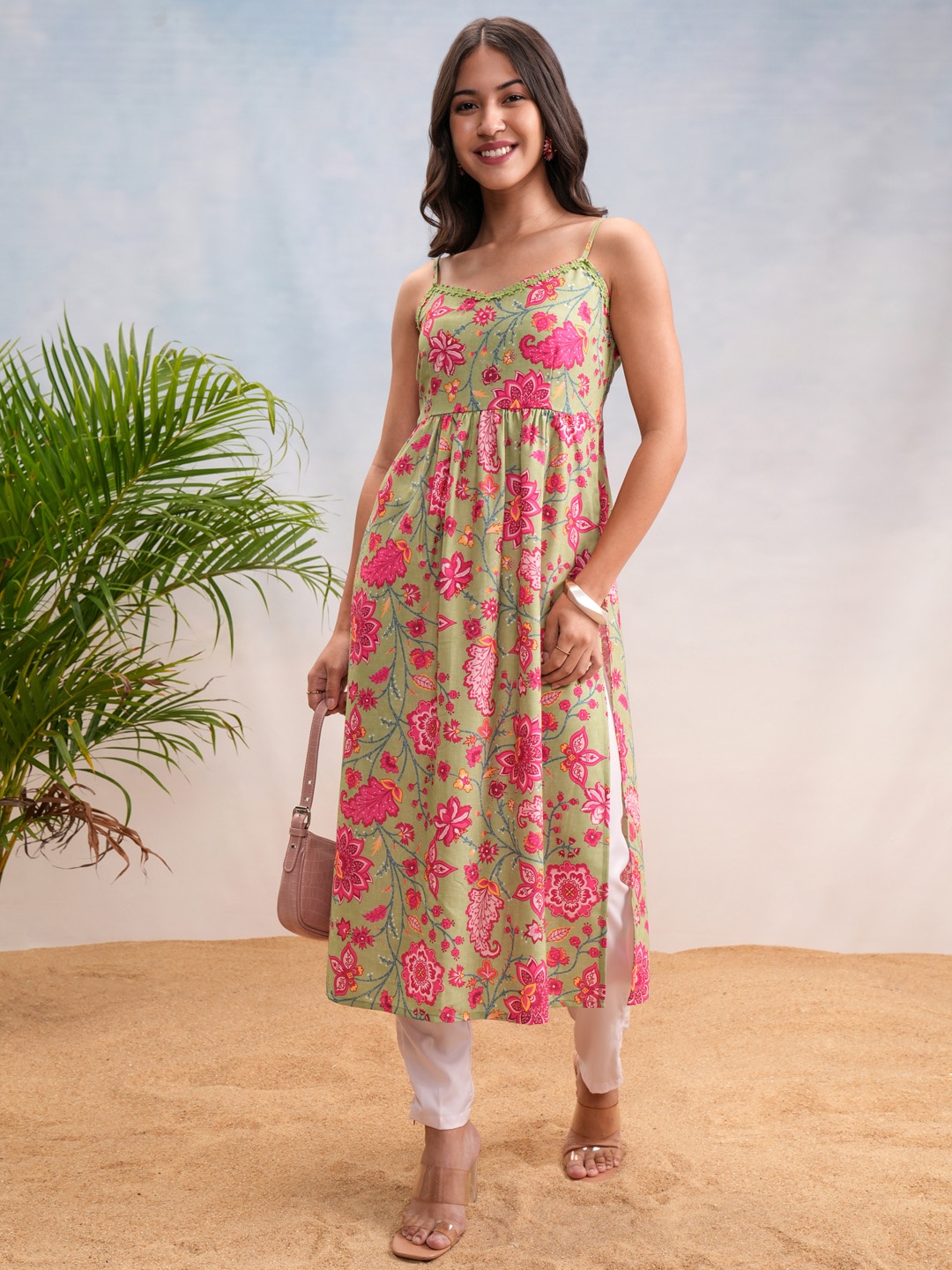 

Vishudh Pista Green Floral Printed Shoulder Straps Straight Kurta