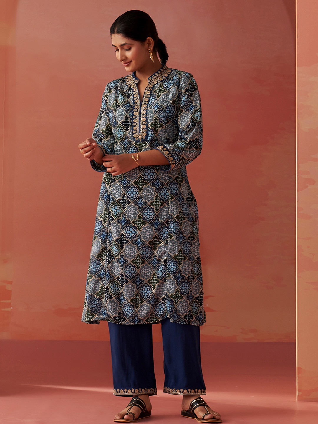 

Lakshita Ethnic Motifs Printed Thread Work Mandarin Collar Straight Kurta With Trousers, Blue
