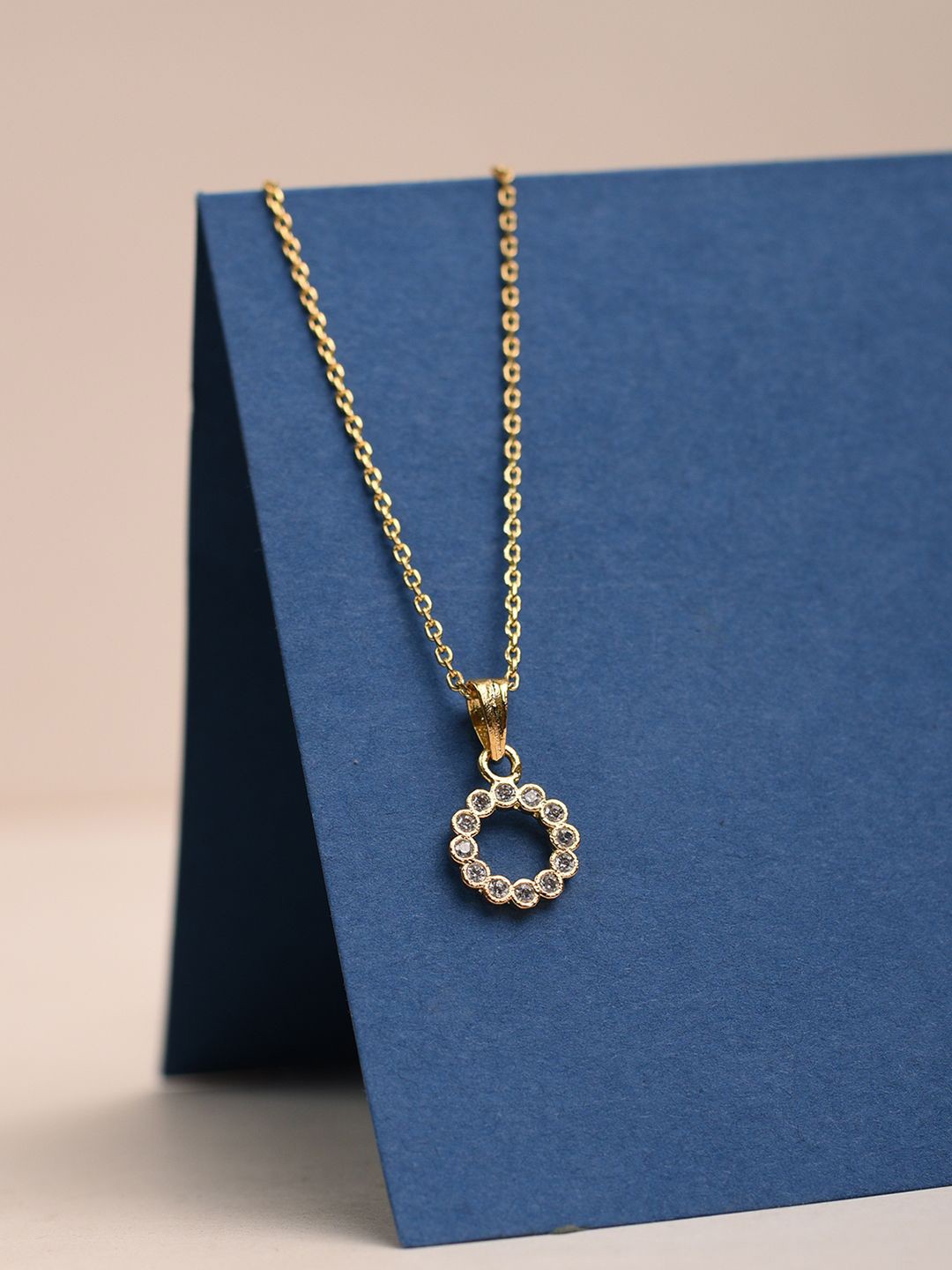

XPNSV Gold Plated Cubic Zirconia Studded Pendant with Chain