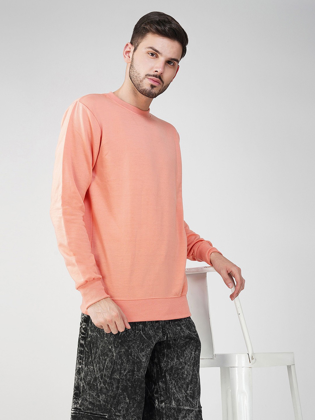 

The Roadster Lifestyle Co. Men Solid Round Neck Cotton Pullover Sweatshirt, Pink