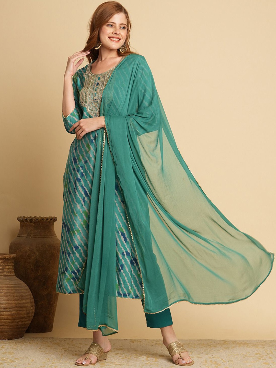 

GoSriKi Leheriya Printed Round Neck Straight Kurta With Trousers & Dupatta, Green