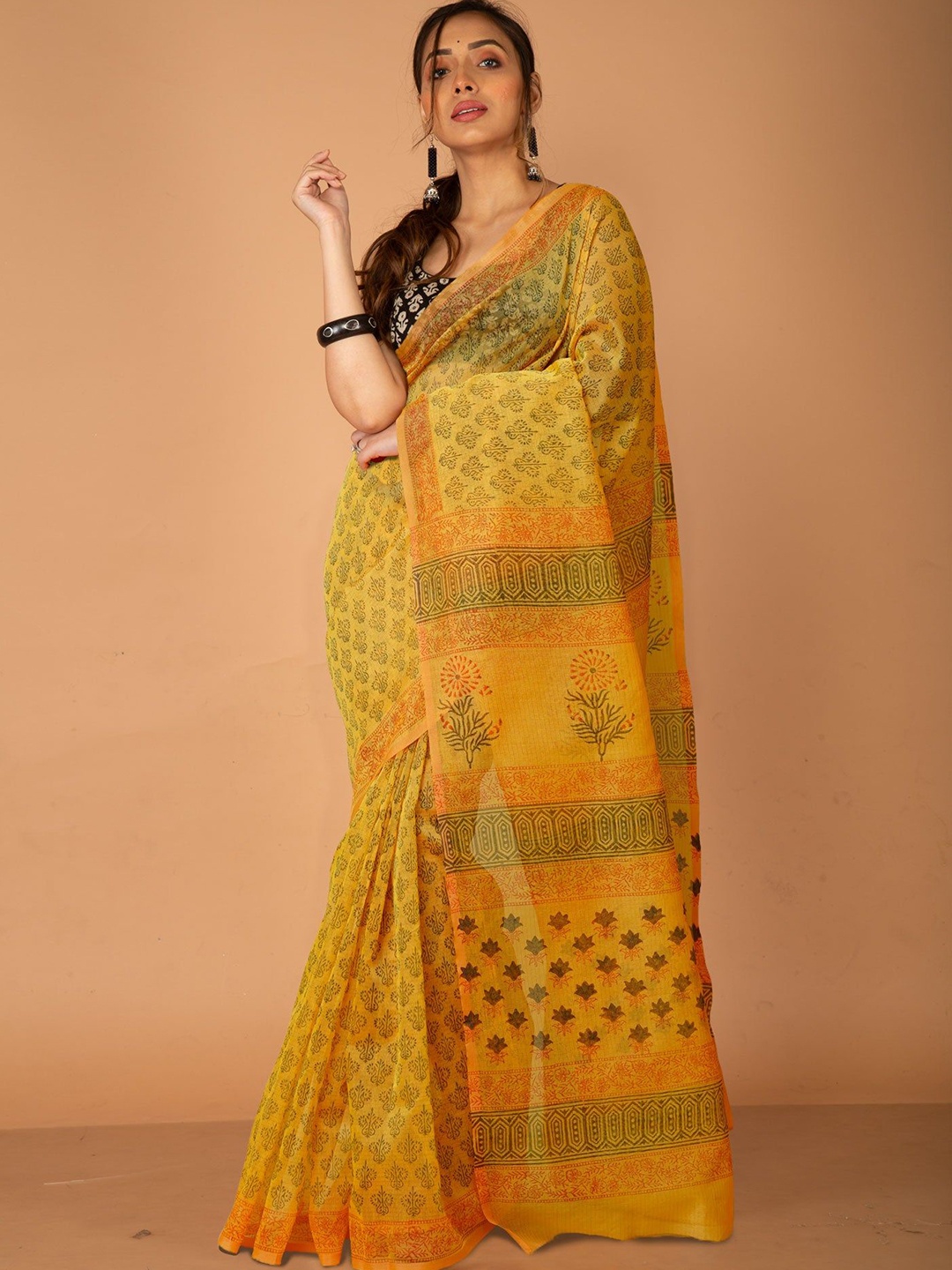

Unnati Silks Ethnic Motifs Supernet Handloom Block Print Saree, Yellow