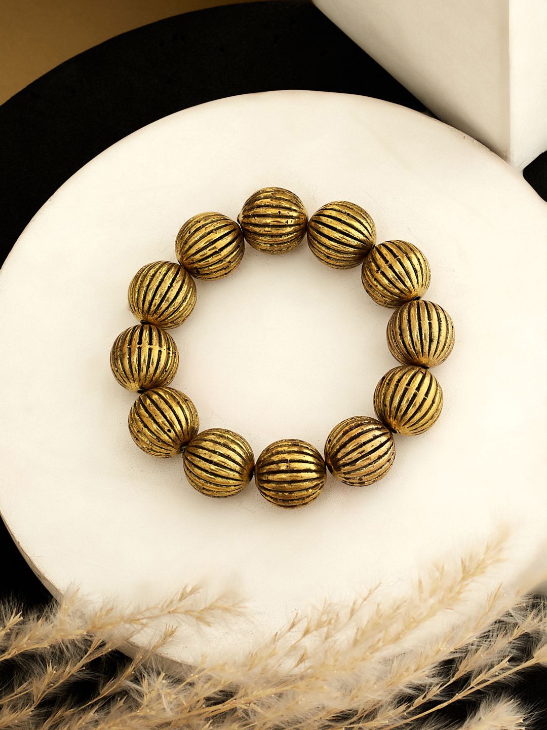 

ATIBELLE Gold-Plated Textured Round-Shaped Elasticated Bracelet