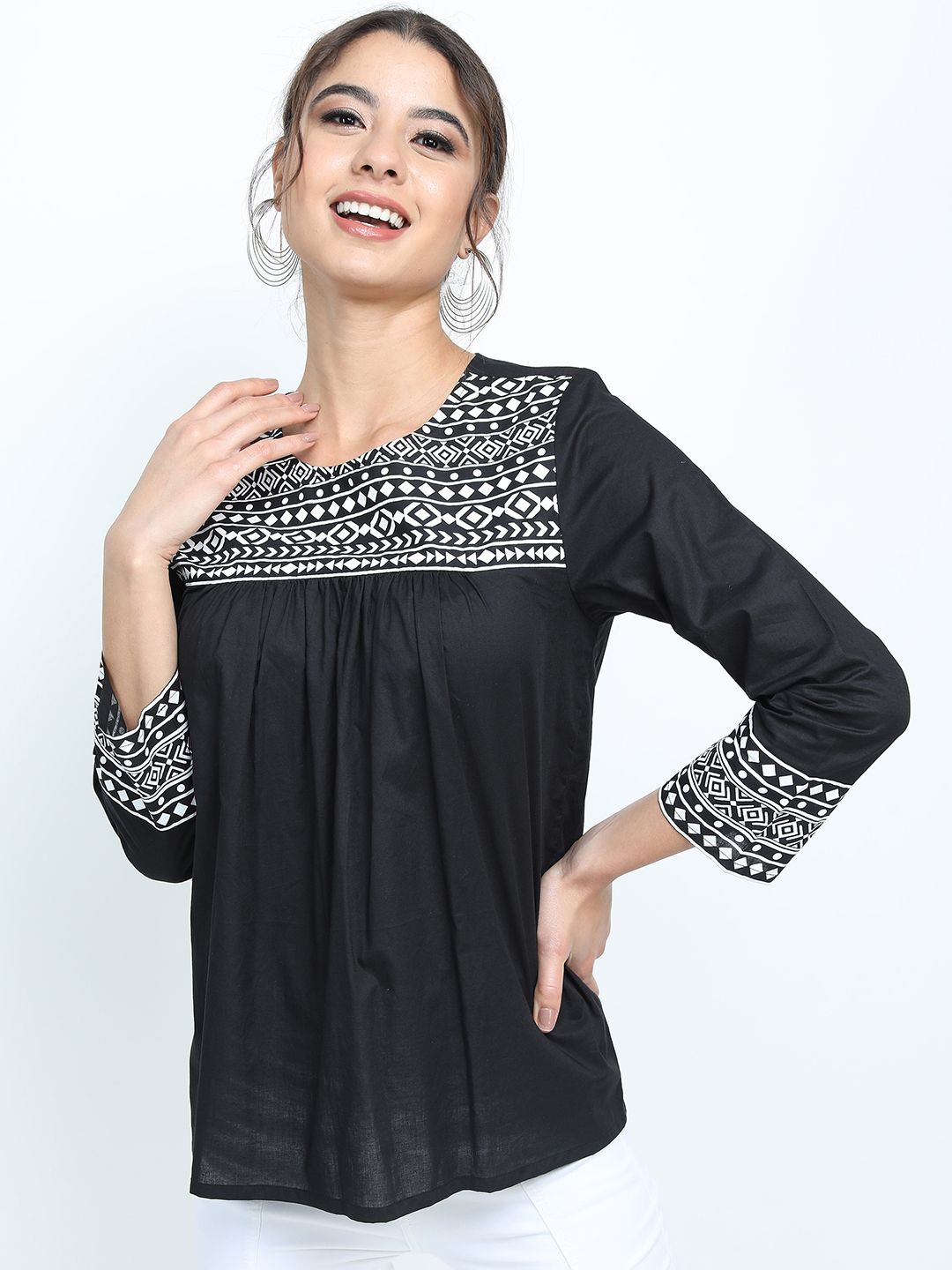 

Vishudh Women Ethnic Motifs Printed Round Neck Top, Black