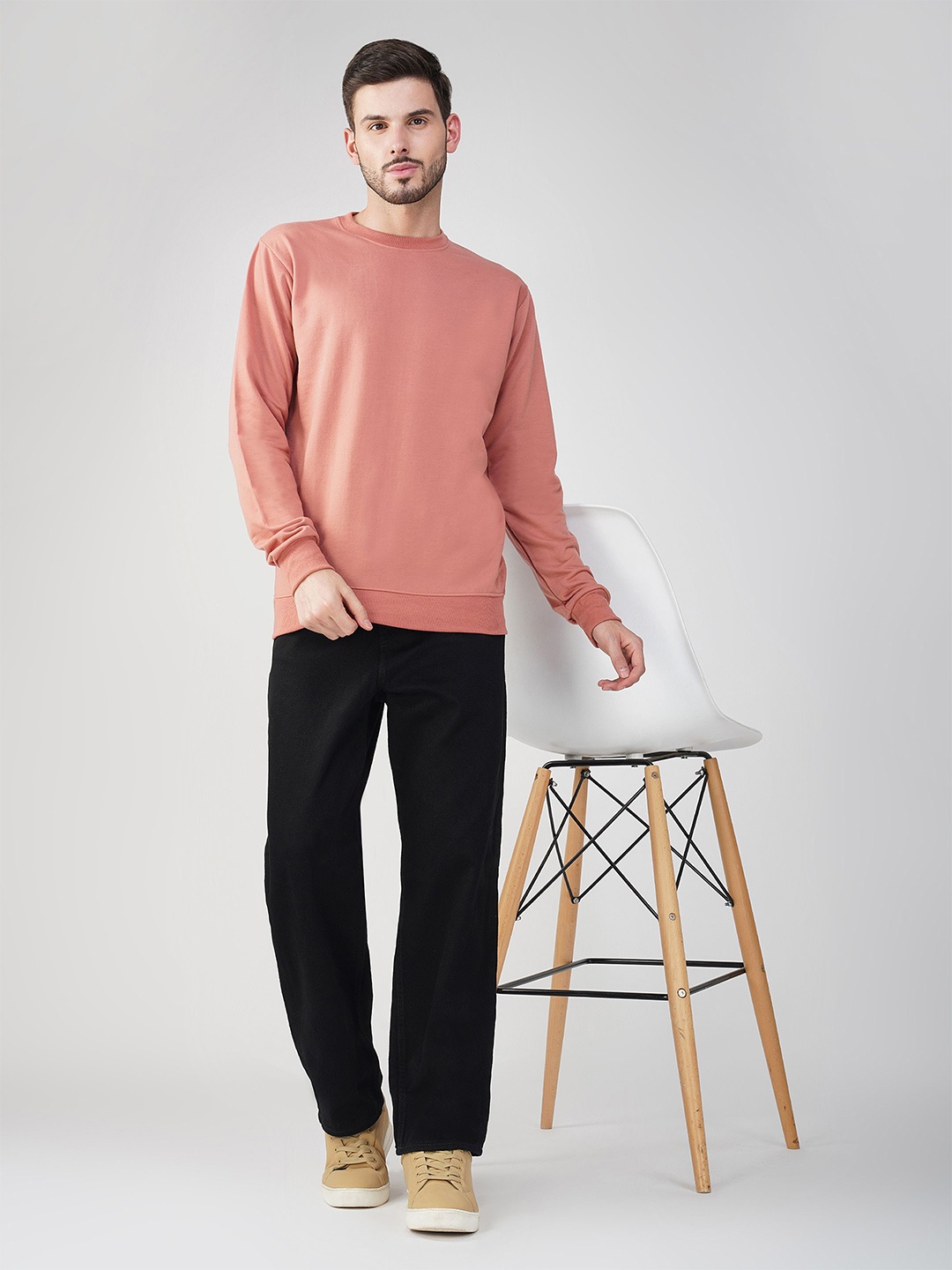 

The Roadster Lifestyle Co. Men Solid Round Neck Cotton Pullover Sweatshirt, Peach