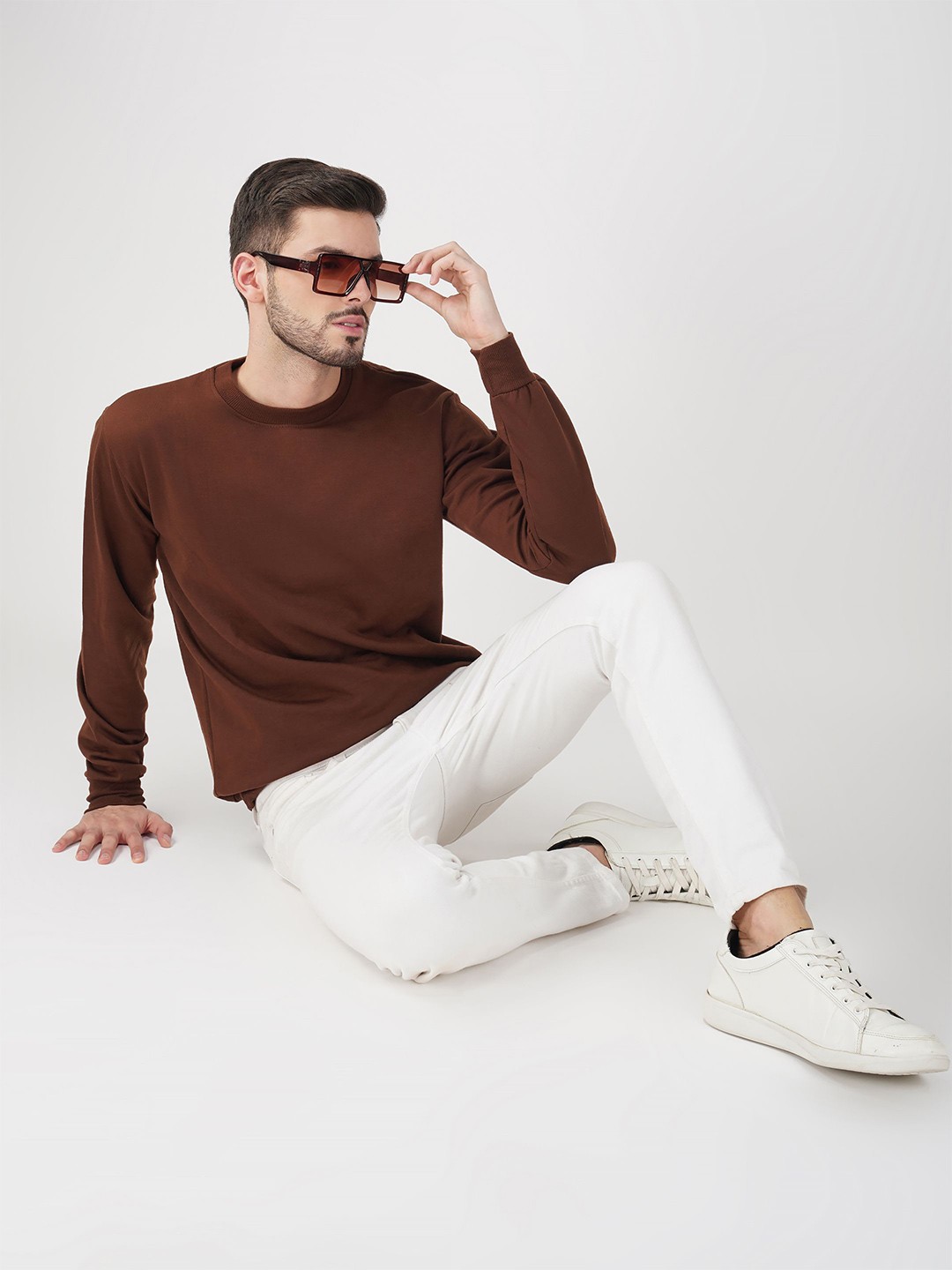 

The Roadster Lifestyle Co. Men Solid Round Neck Cotton Pullover Sweatshirt, Brown