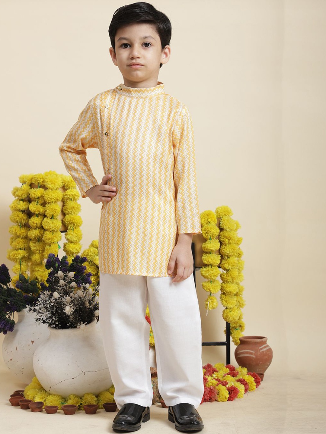 

Cutiekins Boys Geometric Printed Mandarin Collar Angrakha Straight Kurta With Pyjamas, Mustard