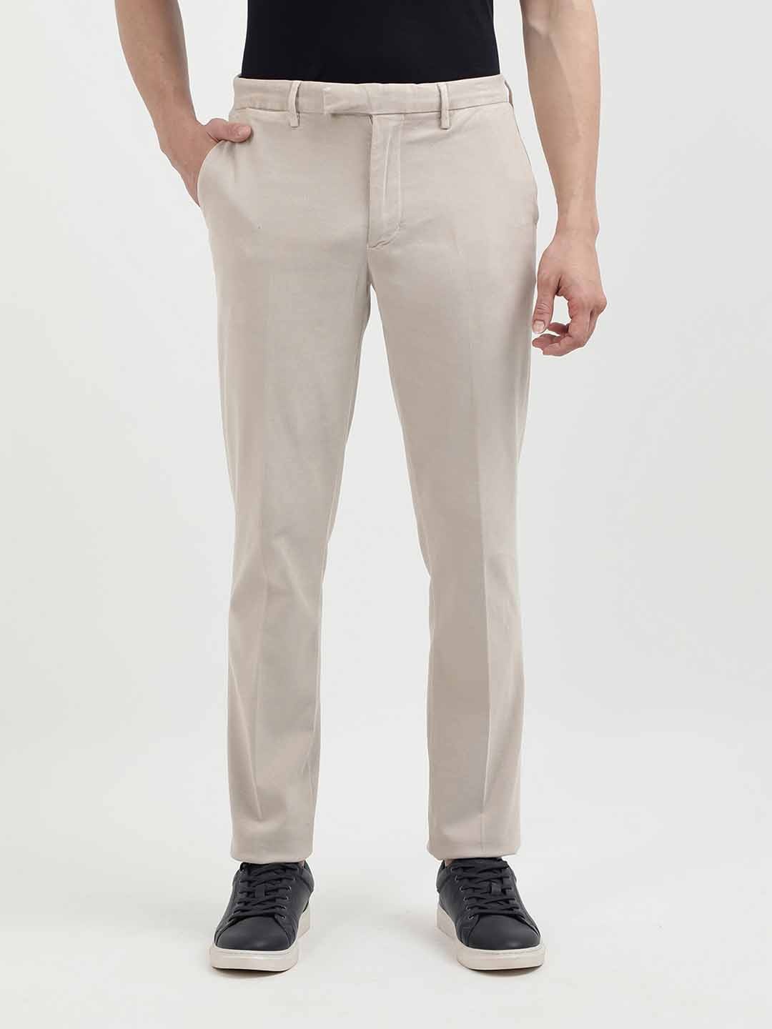 

Tommy Hilfiger Men Solid Chinos Trousers, Beige