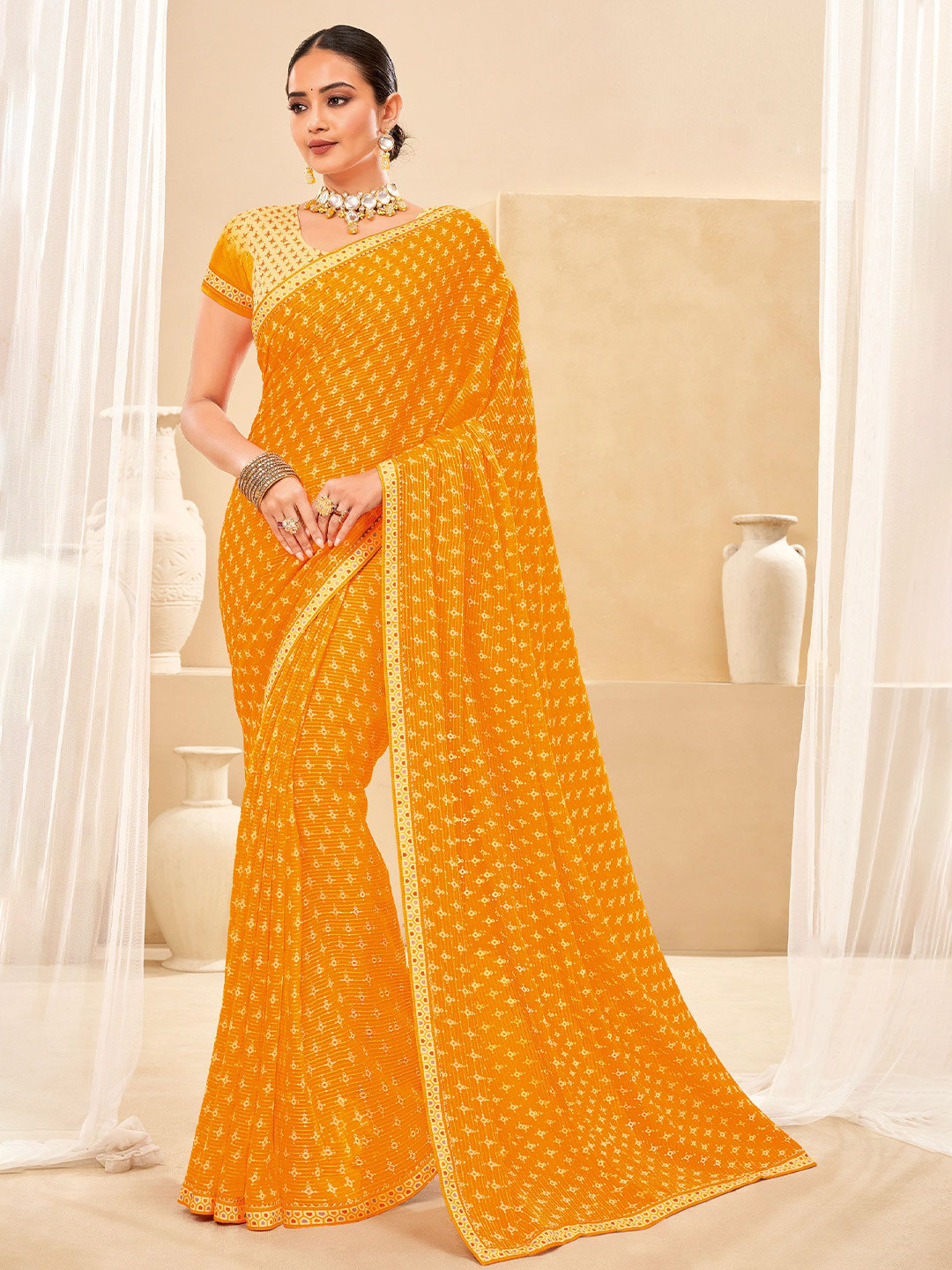 

Laxmipati Ethnic Motifs Embroidered Saree, Mustard