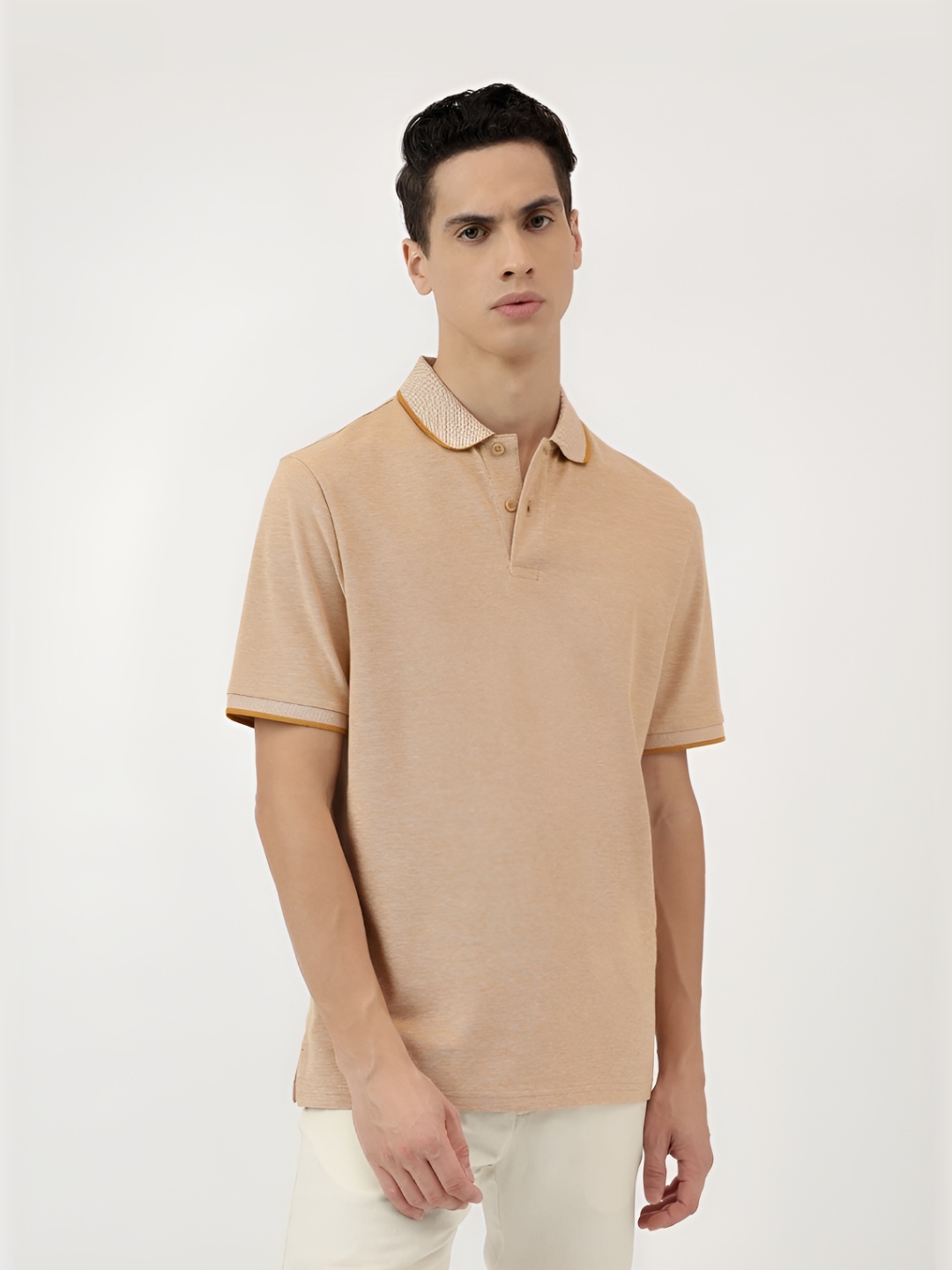 

Marks & Spencer Men Solid Polo Collar Cotton T-shirt, Mustard