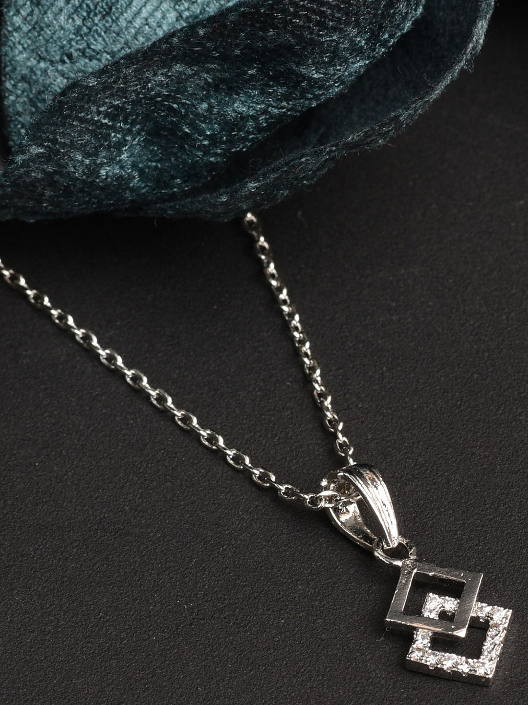 

XPNSV Silver Plated Cubic Zirconia Studded Pendant with Chain
