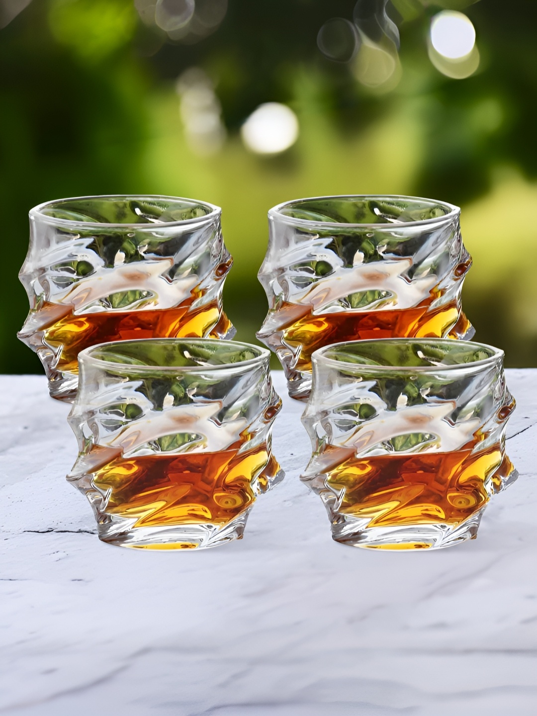 

The Better Home Transparent 4 Pieces Textured Whiskey Glasses 240ml