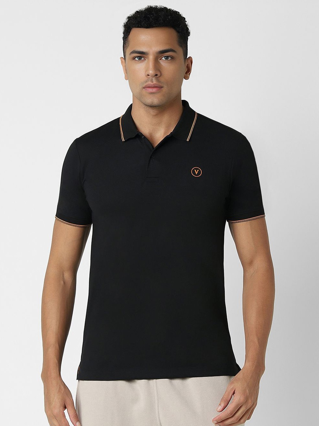 

Van Heusen Flex Men Solid Polo Collar Cotton T-shirt, Black