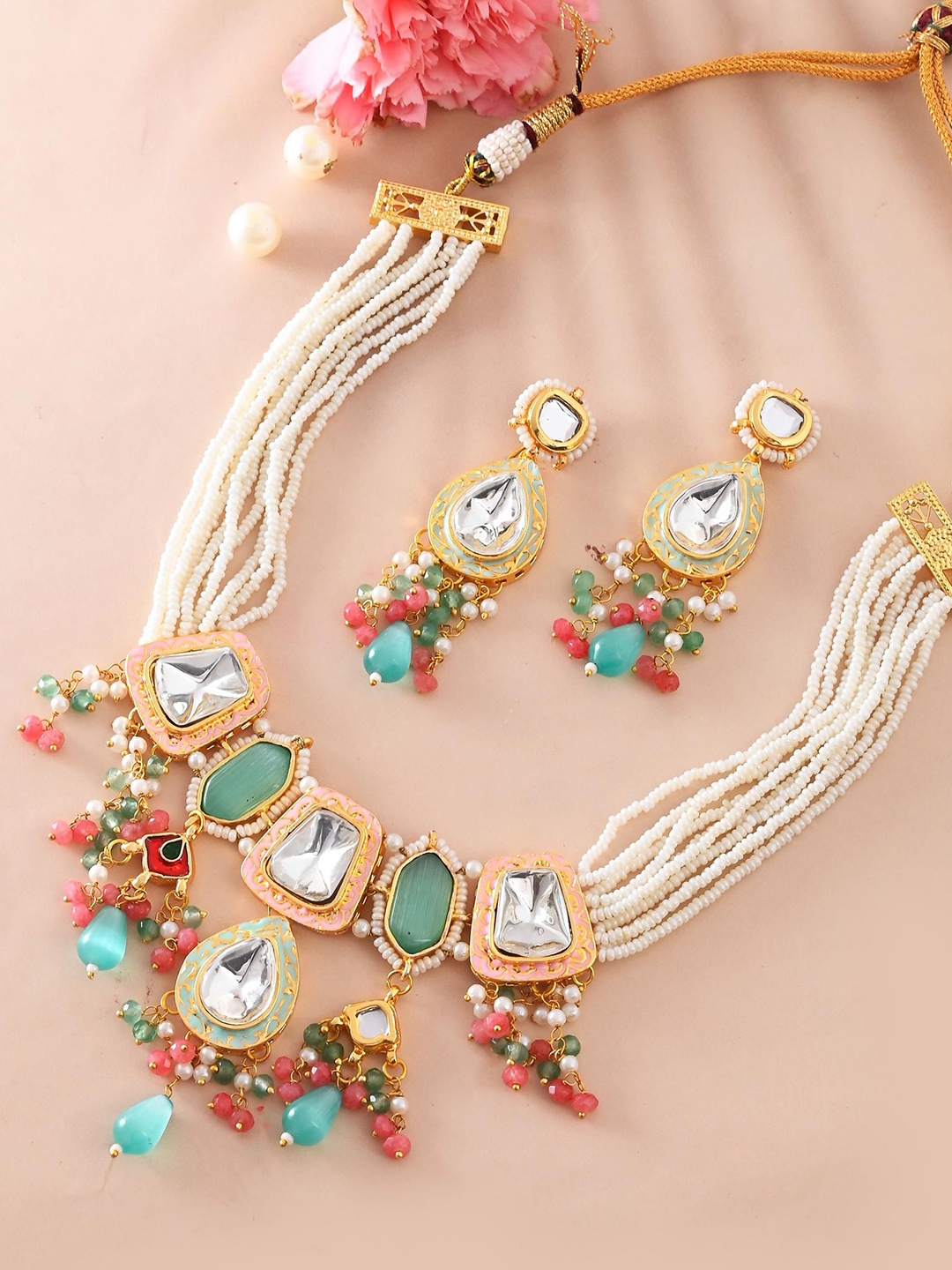

DASTOOR Gold Plated Kundan Studded & Beaded Necklace & Earrings