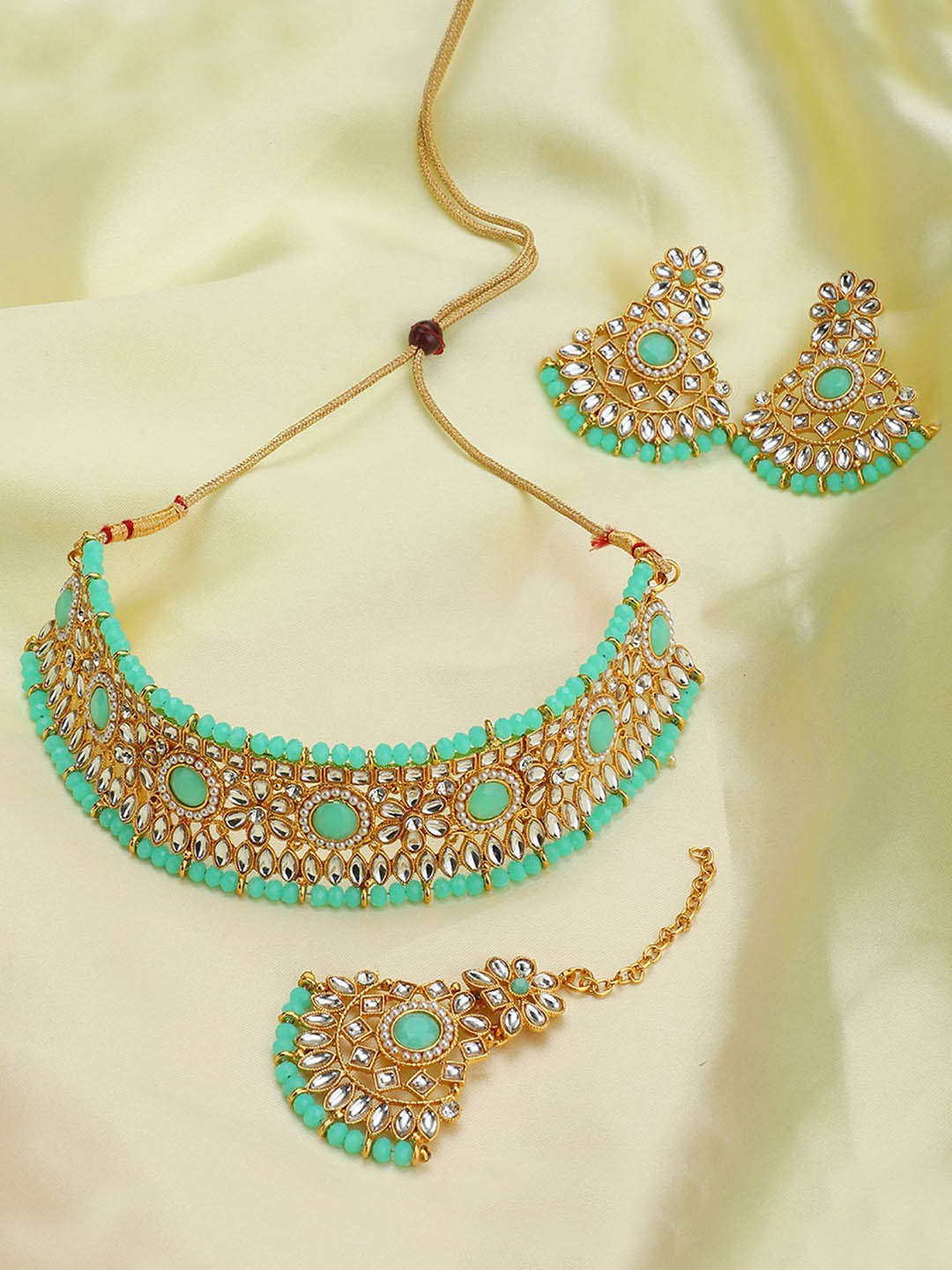 

ANIKAS CREATION Gold-Plated Stone-Studded Jewellery Set