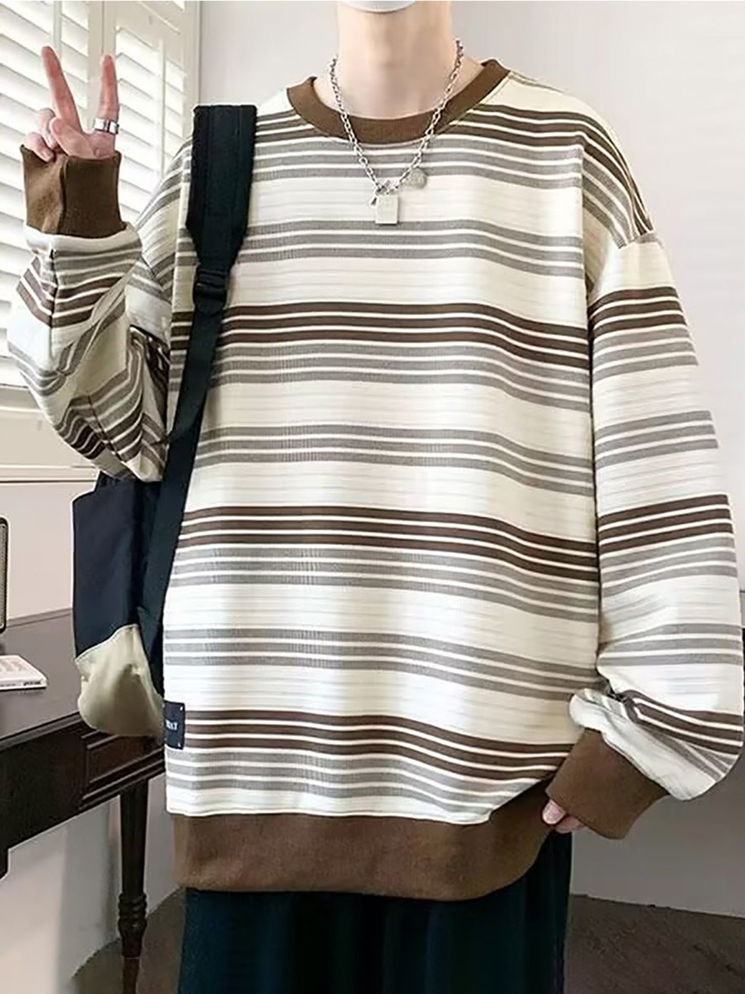 

StyleCast x Revolte Men Striped Round Neck Pullover Sweatshirt, Beige