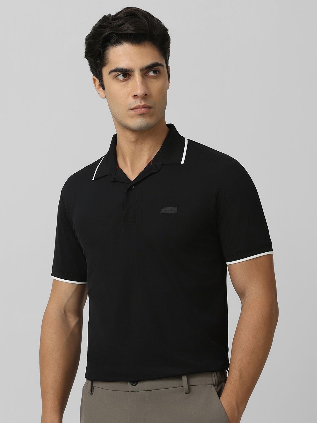 

Mufti Men Solid Polo Collar Nylon Slim Fit T-shirt, Black