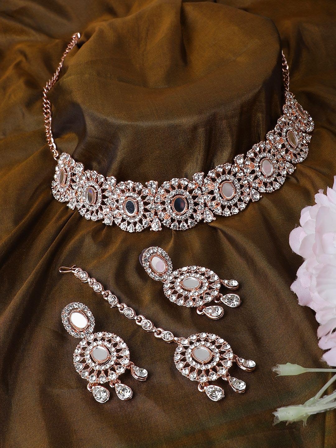

ANIKAS CREATION Rose Gold-Plated AD Studded Necklace And Earrings With Maang Tika