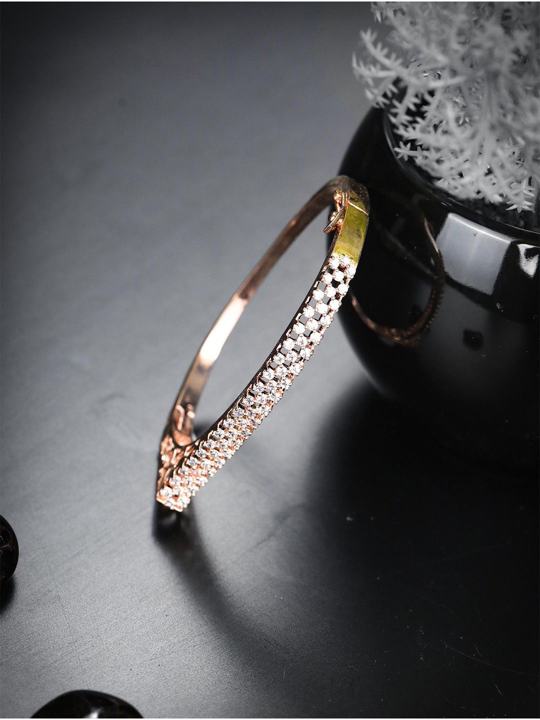 

Priyaasi Gold-Plated American Diamond Studded Statement Charm Bracelet