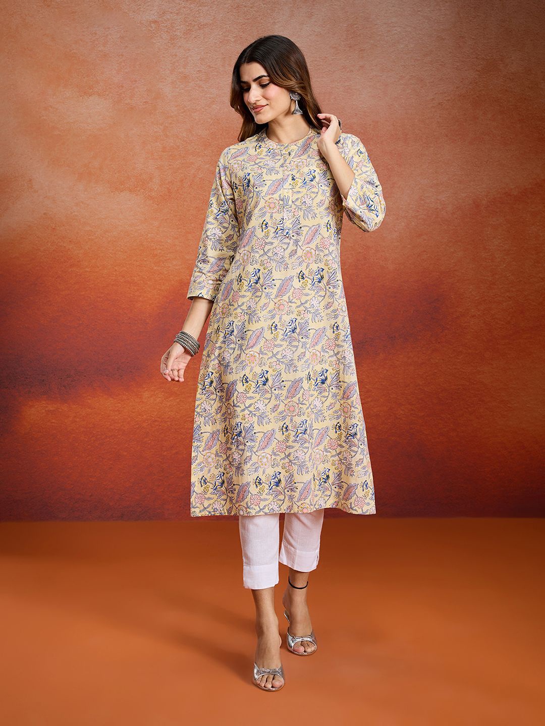 

Likha Women Printed Cotton Kurta, Yellow