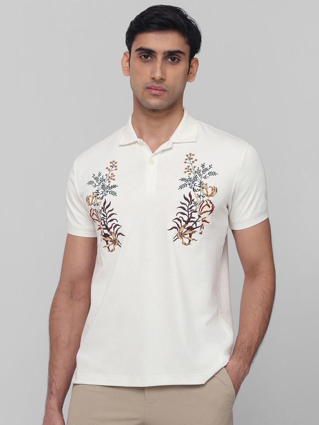 

Mufti Men Embroidered Solid Polo Collar Cotton Slim Fit T-shirt, Off white