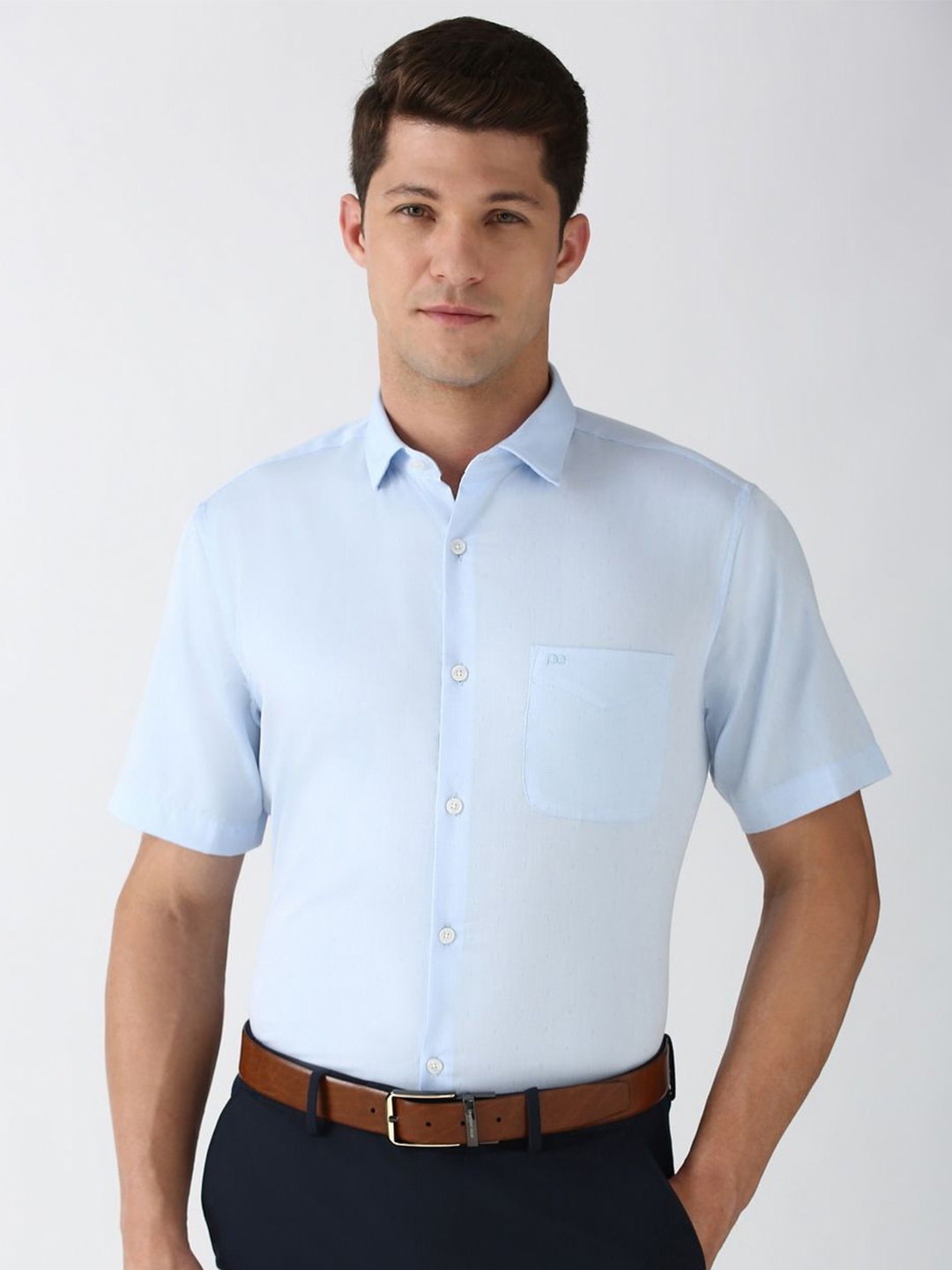 

Peter England Elite Men Spread Collar Solid Cotton Formal Shirt, Blue