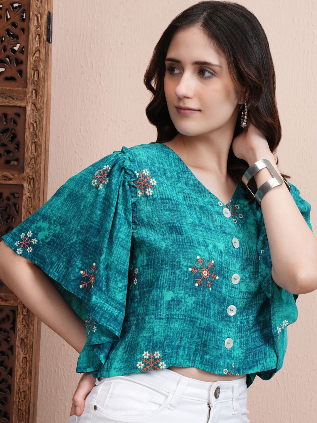 

Vishudh Women Abstract Printed V-Neck Top, Teal