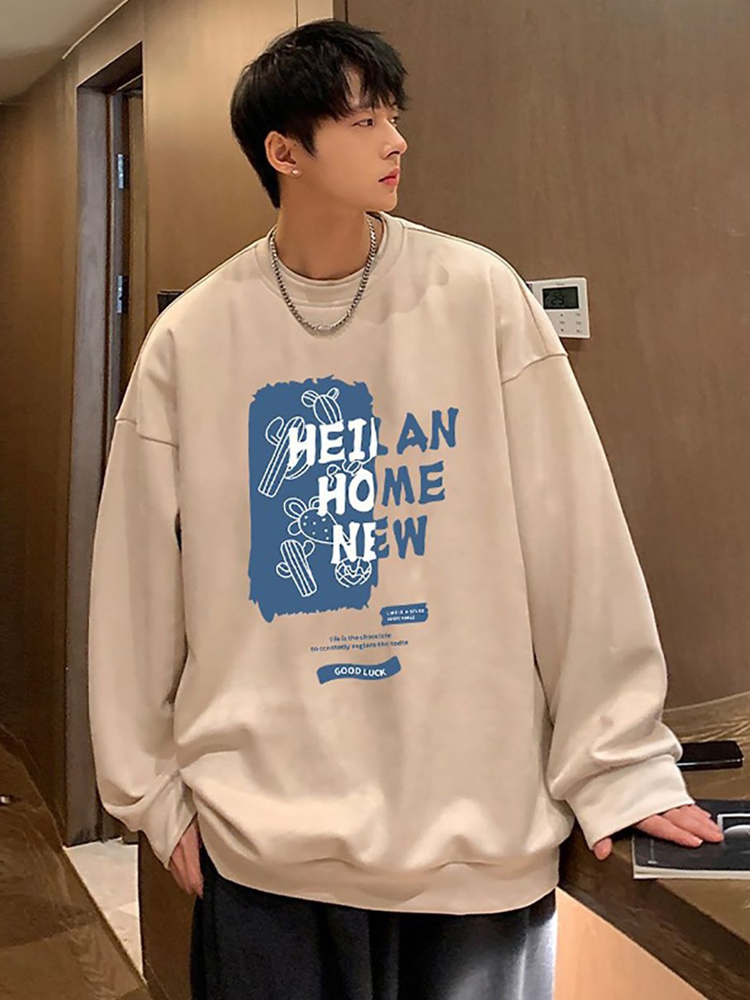 

StyleCast x Revolte Men Typography Printed Round Neck Pullover Sweatshirt, Beige