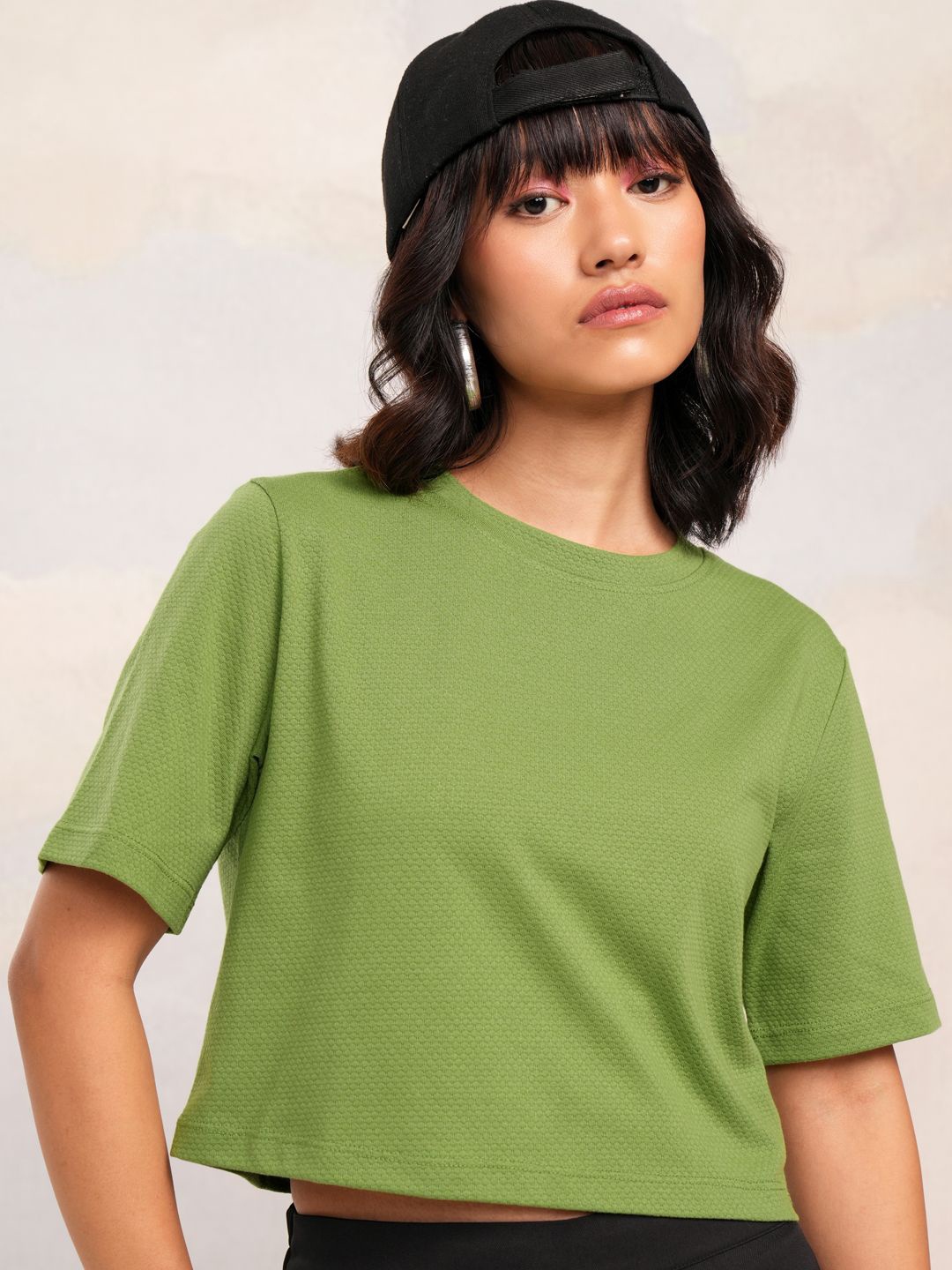 

Tokyo Talkies Women Solid Round Neck Top, Green