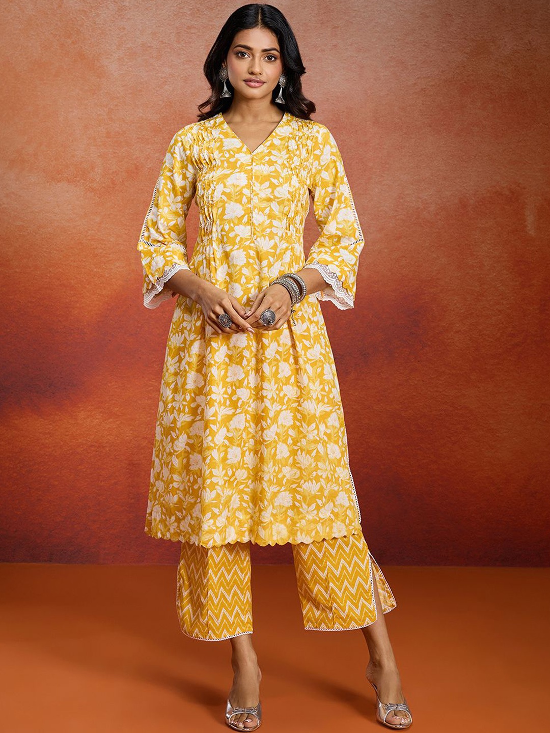 

Likha Floral Printed Pleated Pure Cotton A-Line Kurta with Trousers, Yellow