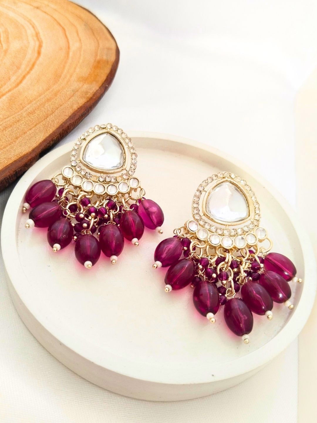 

Anouk Gold-Plated Kundan Studded Teardrop Shaped Drop Earrings, Maroon