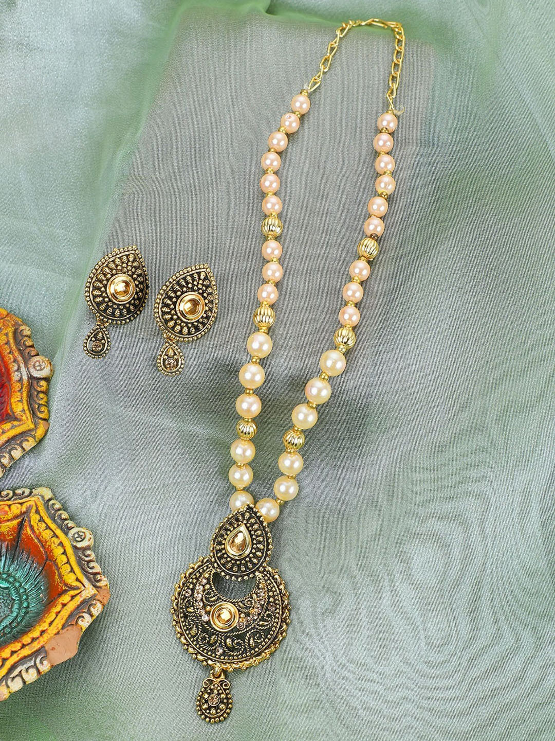 

ANIKAS CREATION Gold-Plated Stone Studded & Beaded Jewellery Set