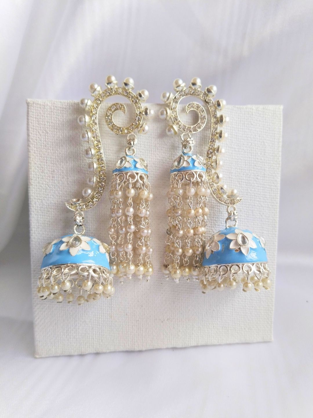 

Anouk Gold Plated Contemporary Kundan Studded Meenakari Jhumkas, White