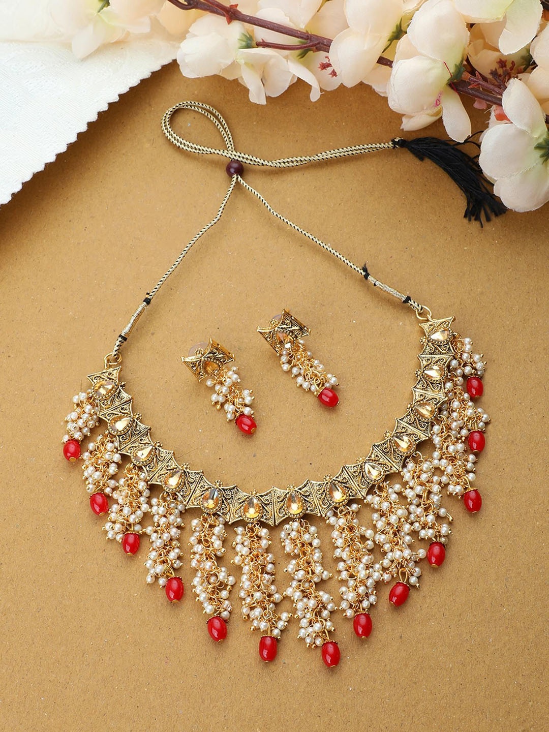 

ANIKAS CREATION Gold-Plated Stone-Studded & Pearls Beaded Jewellery Set