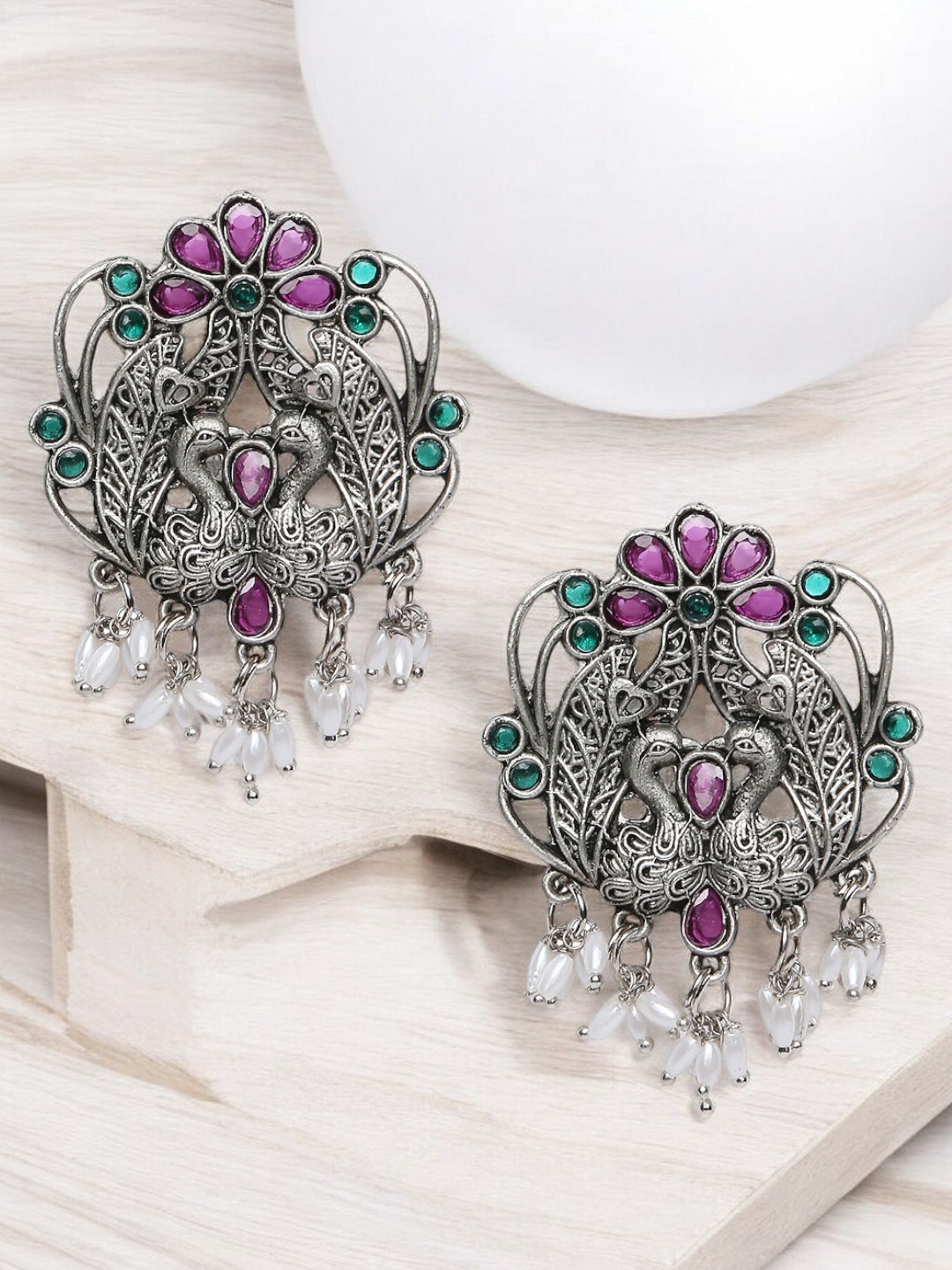 

OOMPH Artificial Stones Studded and Beaded Peacock Shaped Oxidised Drop Earrings, Maroon