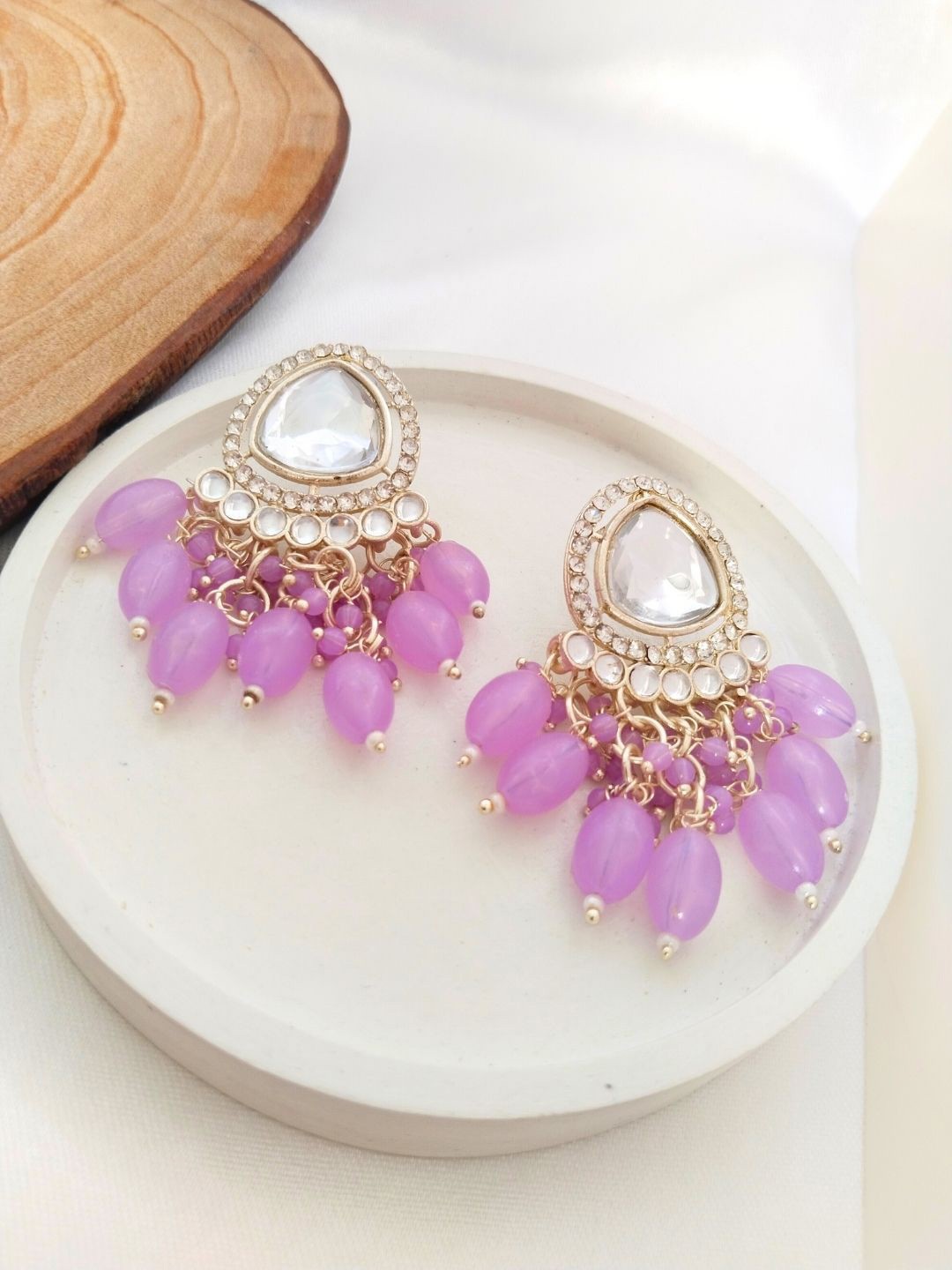 

Anouk Purple Gold-Plated Teardrop Shaped Kundan Studded Drop Earrings