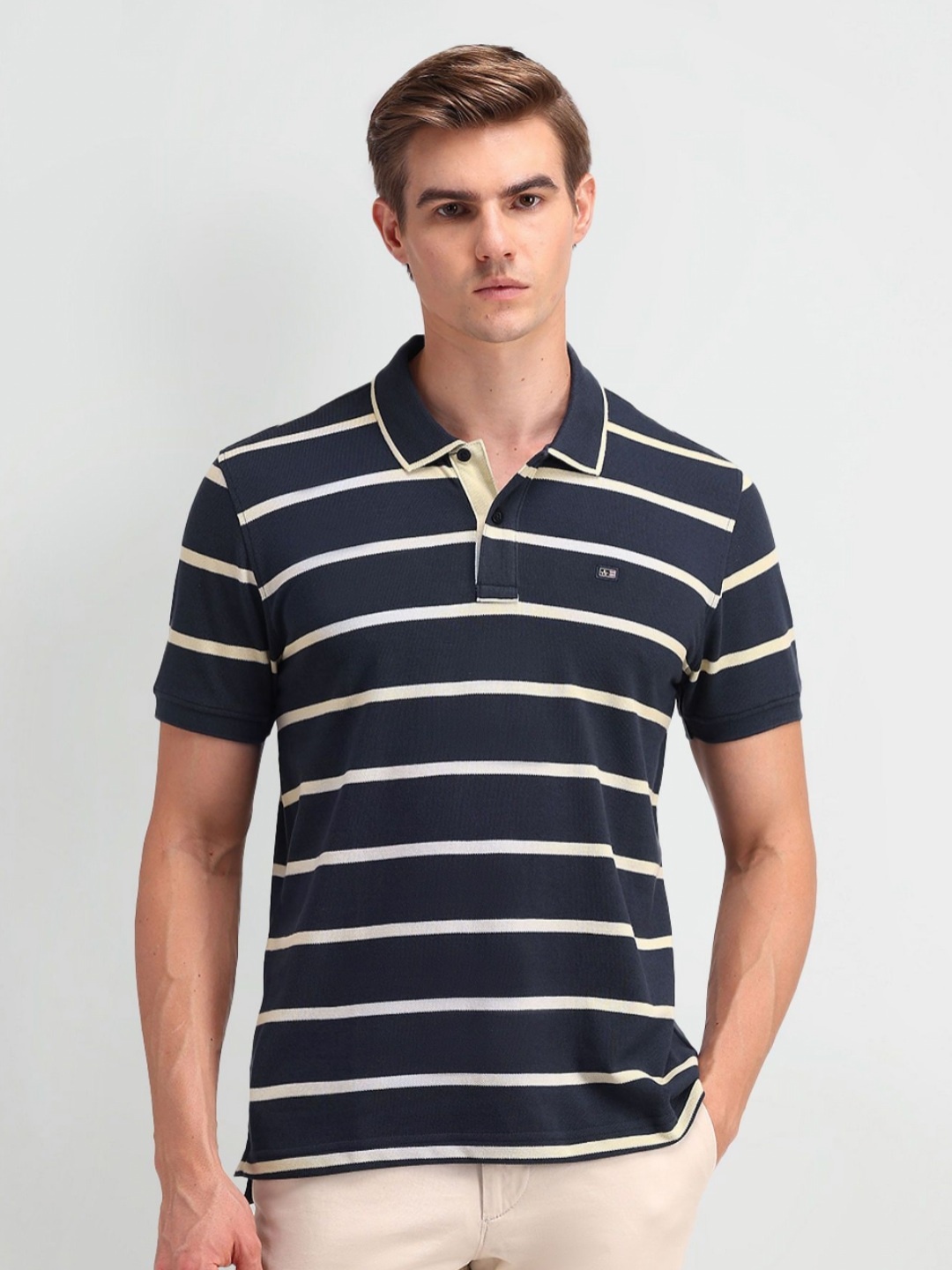 

Arrow Sport Men Striped Polo Collar T-shirt, Blue