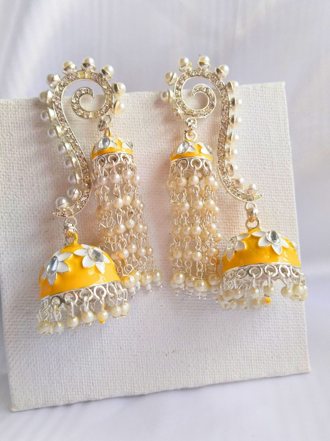 

Anouk Gold Plated Contemporary Kundan Studded Meenakari Jhumkas, White