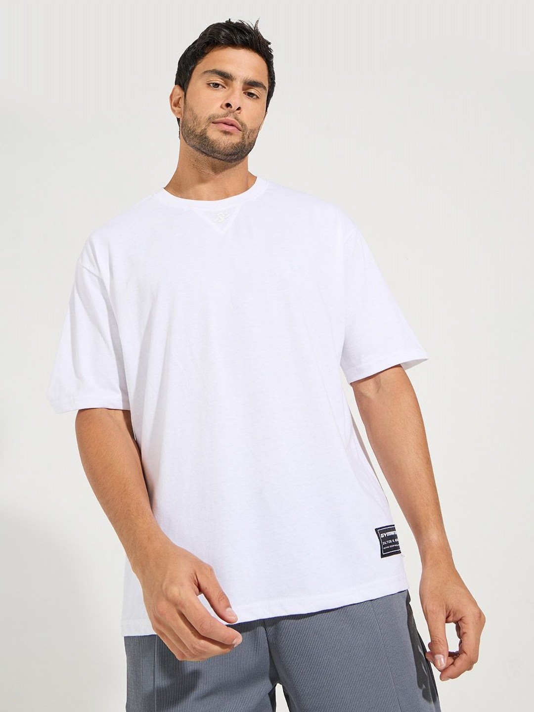 

Styli White Drop-Shoulder Sleeves Oversized Athleisure T-Shirt