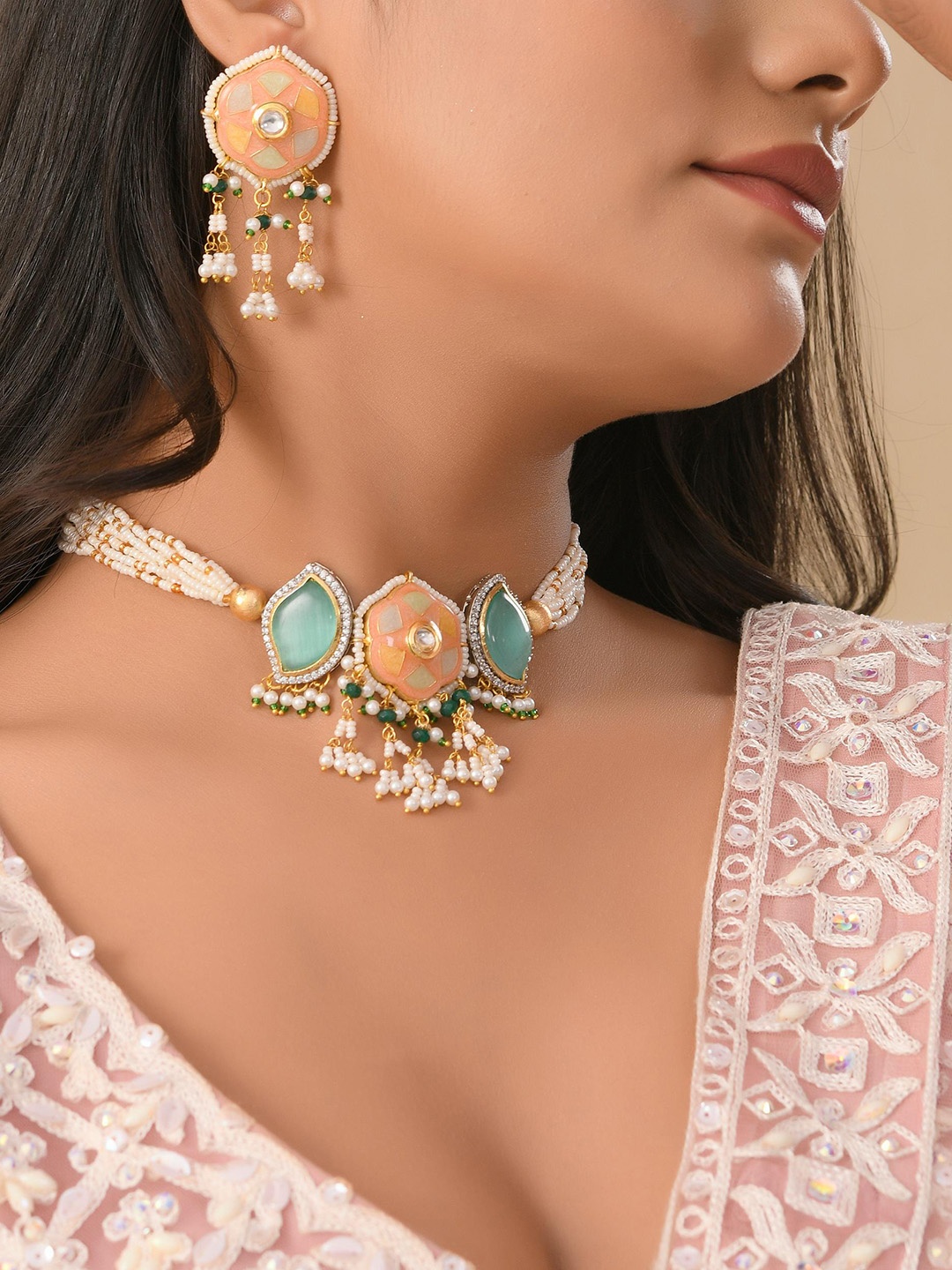 

DASTOOR Gold Plated Kundan Studded & Beaded Necklace & Earrings