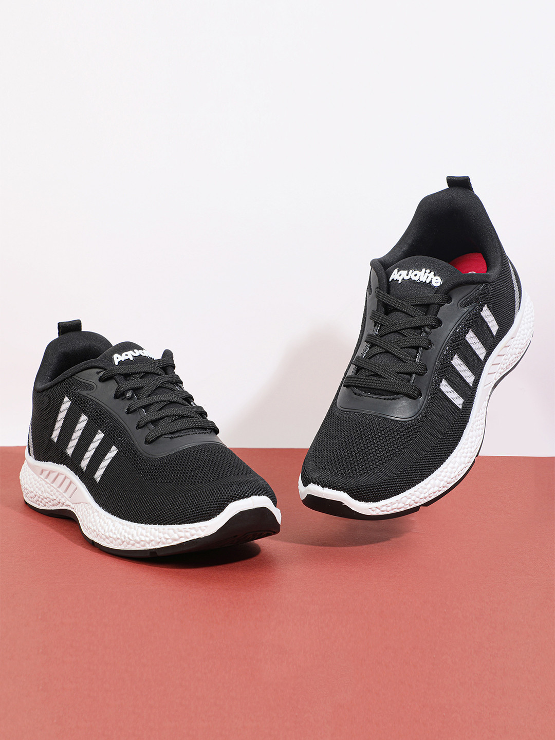 

Aqualite Women Striped Mesh Sneakers, Black