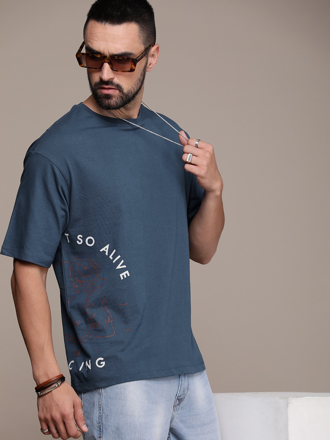 

The Roadster Life Co. Pure Cotton Printed Relaxed Fit Drop-Shoulder Sleeves T-shirt, Blue