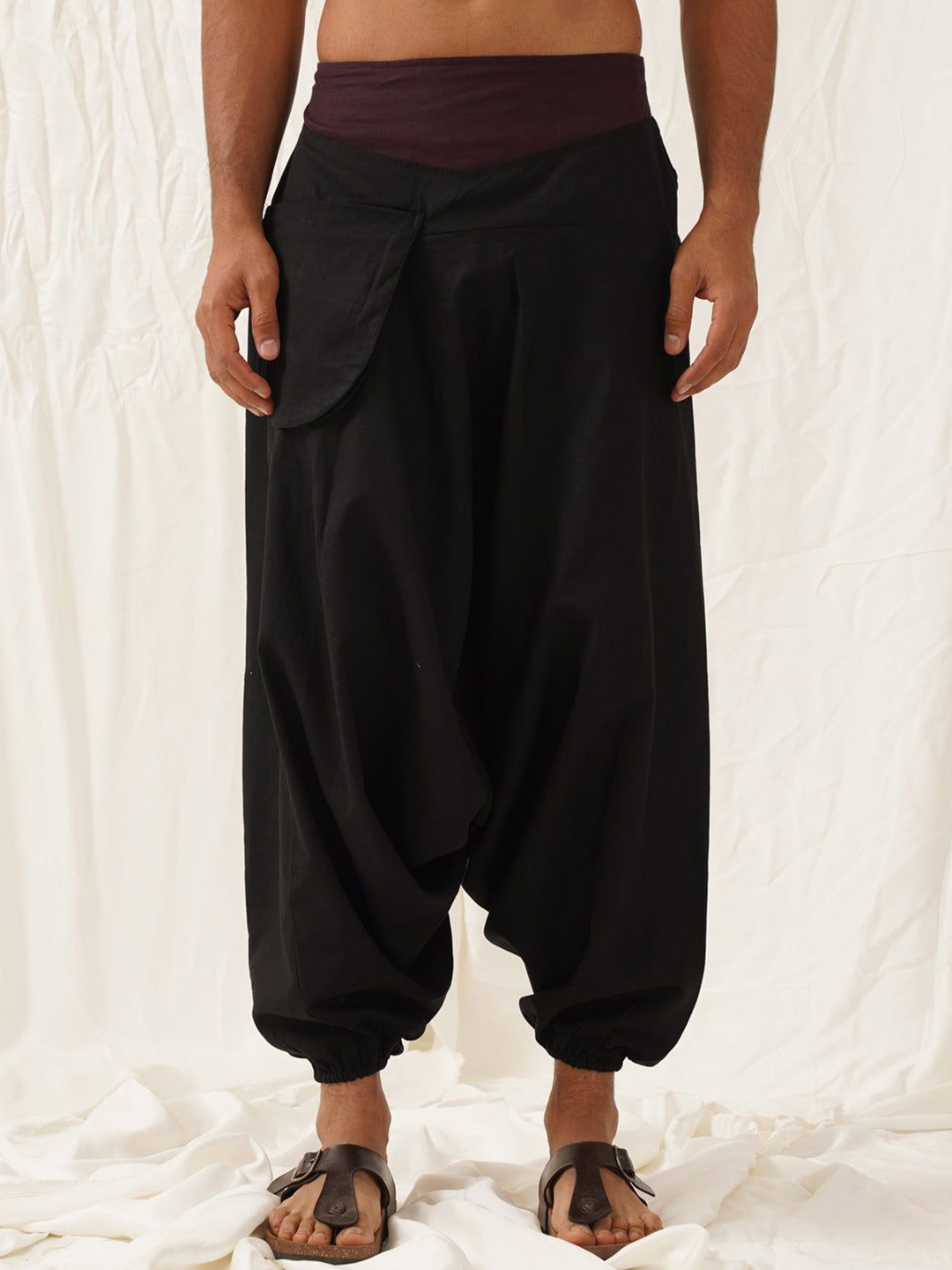 

Kranium Men Solid Mid-Rise Drop Crotch Trousers, Black
