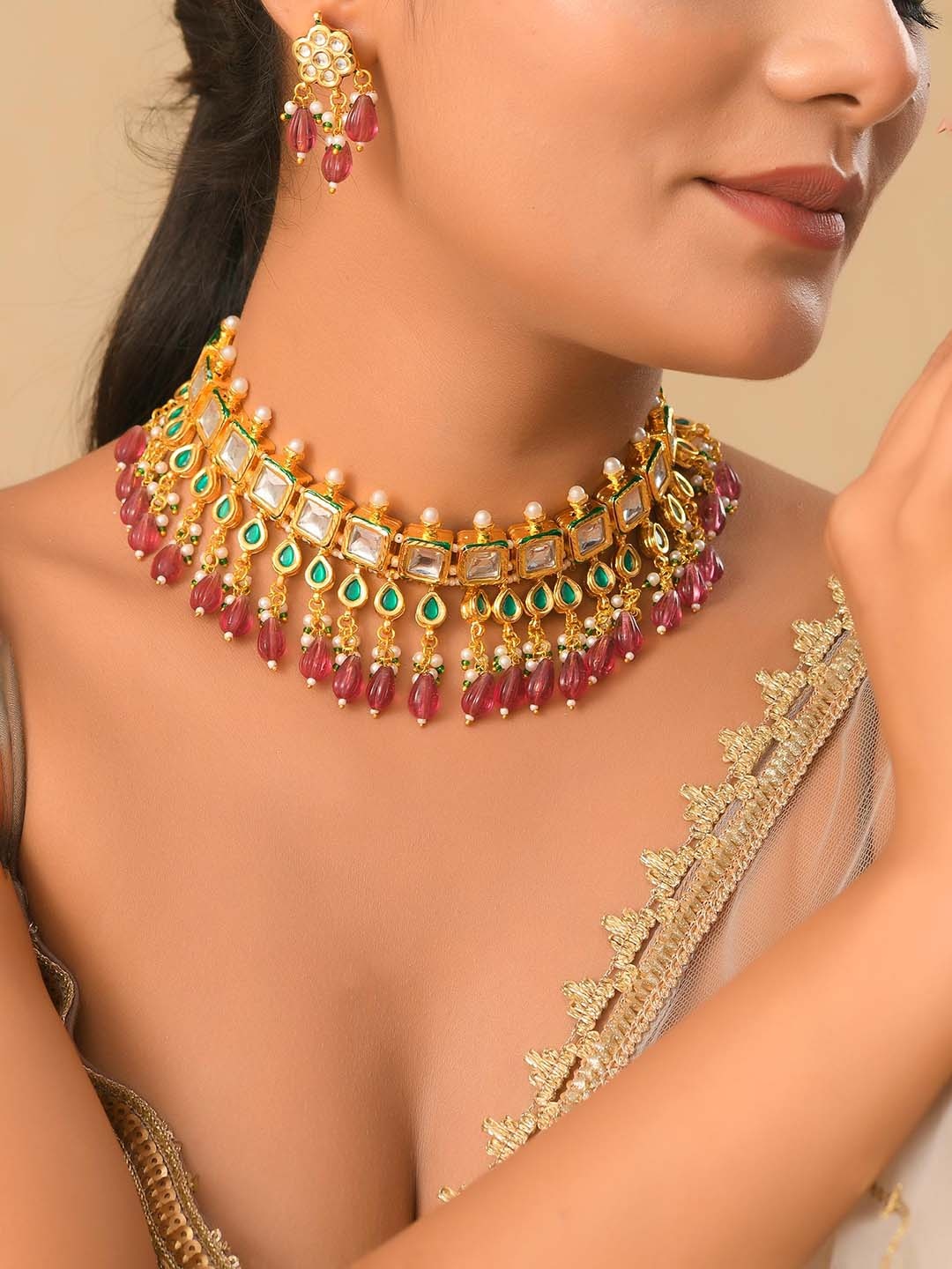 

DASTOOR Gold Plated Stones Studded & Beaded Necklace & Earrings