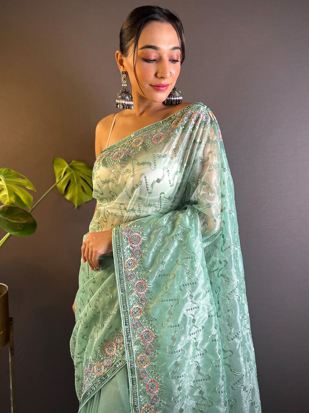 

Anouk Ethnic Motifs Embellished Sequinned Tissue Saree, Sea green