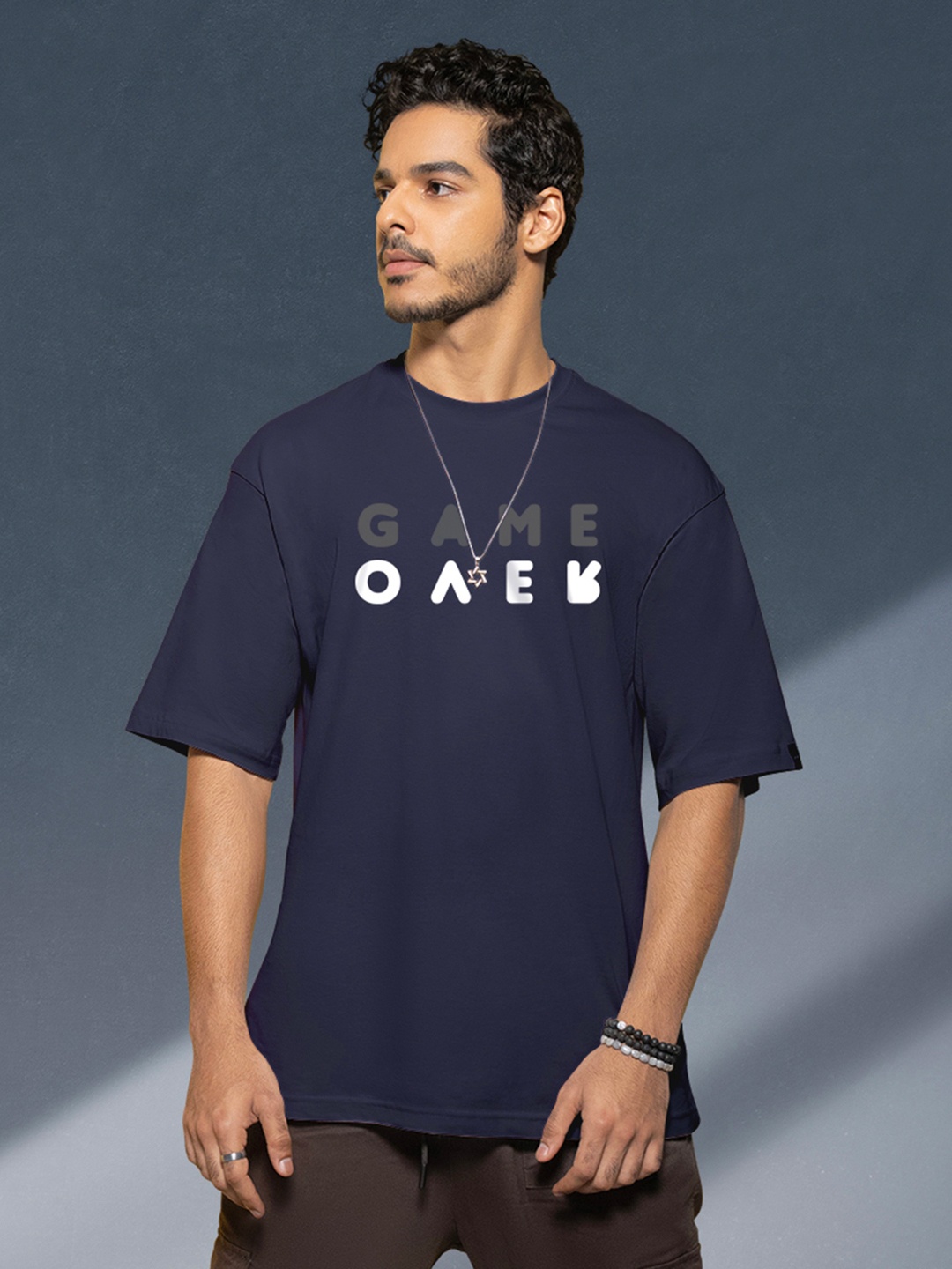 

Bewakoof Men Typography Printed Drop-Shoulder Sleeves Oversize Cotton T-shirt, Blue