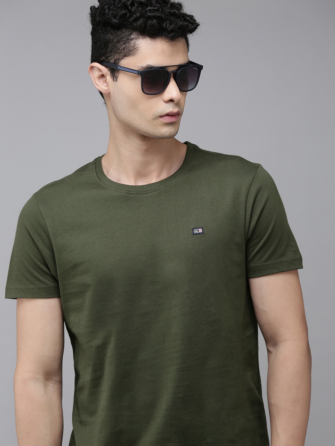 

Arrow Men Olive Green Solid Pure Cotton T-shirt