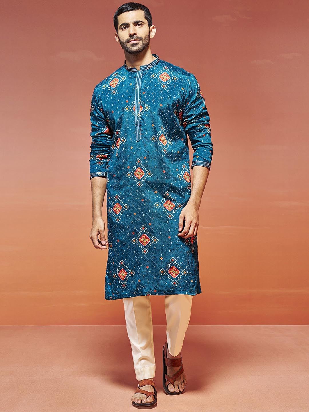 

VASTRAMAY Bandhani Printed Sequinned Mandarin Collar Straight Kurta With Pyjama, Turquoise blue